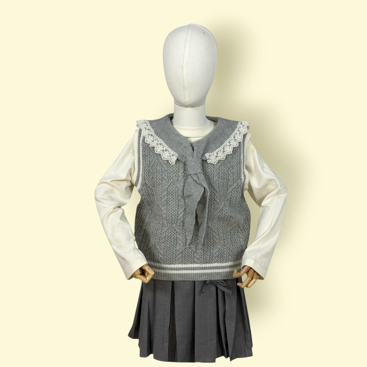 3Pc Girls’ Grey Pleated Skirt & Cream Top with Knitted Lace Vest Set