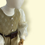 Trendy Girls 3-Piece Olive Printed Skirt Set with Puff Sleeve Top and Stylish Vest