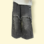 Unisex Black Distressed Wide-Leg Jeans with Paint Splatter Design