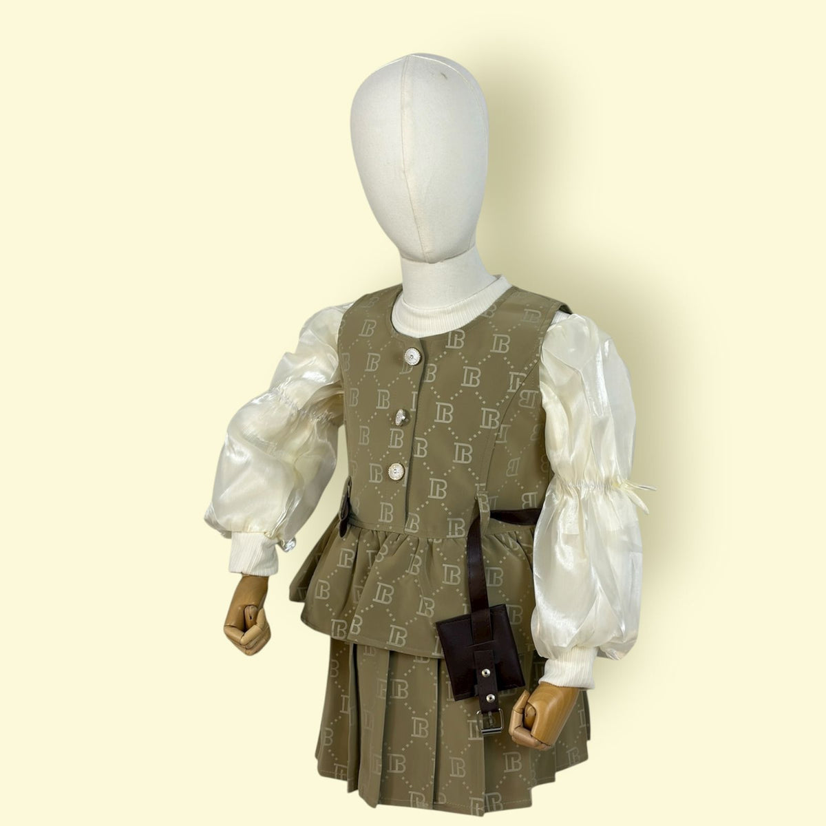 Trendy Girls 3-Piece Olive Printed Skirt Set with Puff Sleeve Top and Stylish Vest