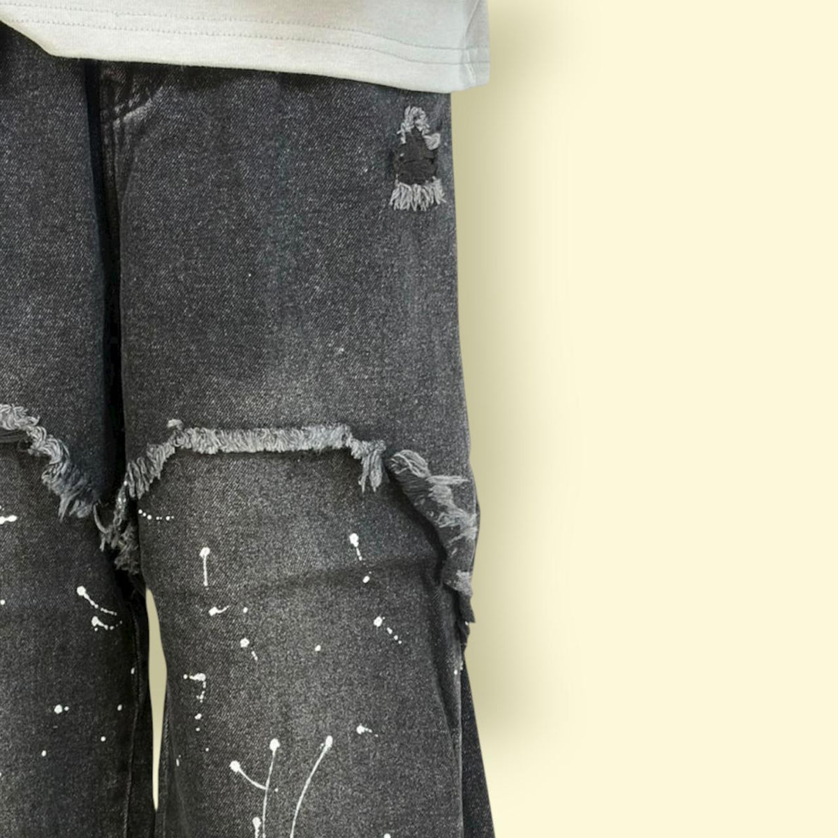 Unisex Black Distressed Wide-Leg Jeans with Paint Splatter Design
